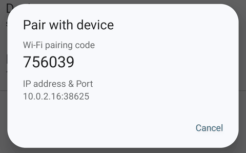 The pairing code popup with the Wi-Fi pairing code and the IP address and port